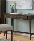 Desk with Brushed Oil Rubbed Bronze Cabinet Ring Pulls, featuring decor and opened book
