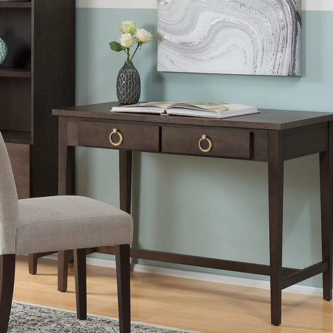 Desk with Brushed Oil Rubbed Bronze Cabinet Ring Pulls, featuring decor and opened book