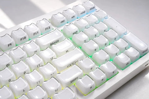 Wireless Mechanical Gaming Keyboard With 95 Percent Layout And Integrated Number Pad In Cream White Glossy Cat Ear Keycaps Running Smooth Creamy Switches With Vibrant Rgb Lighting For Your Sick Desk Setup.