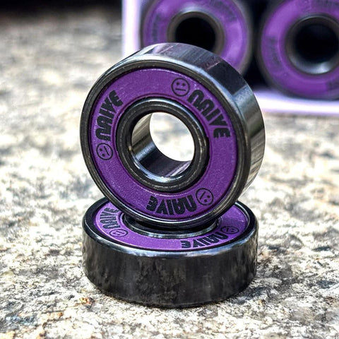 Neon purple 608 skate bearings with 8mm bore; multiple bearings shown