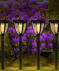 Solar Yard Light 4 Pack Outdoor Lantern Style Pathway Lights Waterproof With Vintage Filament COB Bulbs in garden setting