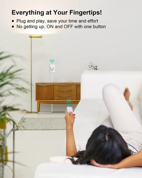 Person using Remote Control Outlet With Portable Magnetic Switch Long Range Wireless 200 Ft On Off Plug in living room