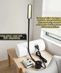 Bright 30 LED Sewing Machine Light with flexible silicone neck and magnetic base on a table, long power cord visible.