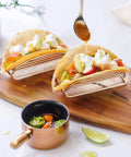 4 Piece Stainless Steel Taco Holder Stand Set With V Shaped Multi Layer Taco Rack For Soft And Hard Shell Tacos on table