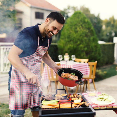 Man cooking with Portable Lightweight Nonstick Cast Iron Cookware Set With Glass Lids And Nylon Utensils 4 Piece Outdoor Camping
