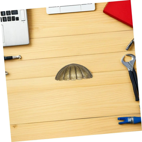 Vintage Shell Cabinet Pulls 4 Pack Antique Bronze Finish shown on wooden surface, heavy-duty cup handle for easy grip.