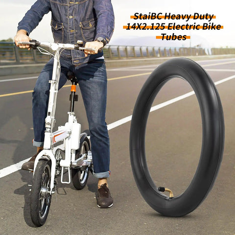 Heavy Duty 14x2.125 Inner Tube With Angled Valve Stem For Electric Scooters And E Bikes displayed with e-bike rider