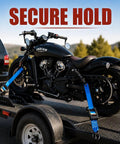 Kickass Grip Retractable Tie Down Straps With Smooth Butter Rewind For Zero Slap Back Mess One Inch By Ten Foot Haul Ready Cargo Belts securing a motorcycle on a trailer.