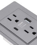 Top Shelf Grey 15 Amp Electrical Wall Outlet With Dual USB Charging Ports And Wall Plate Plug And Play Design For Rock Solid Residential Or Commercial Flush Mount Install showing USB ports and standard sockets.