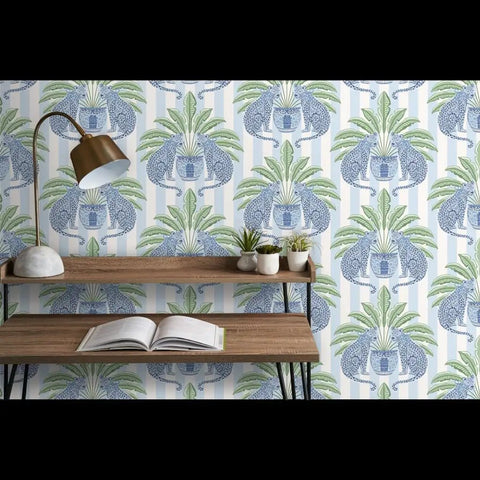 Top Shelf PVC Free Preppy Wallpaper With Heavy Duty Matte Linen Texture Ideal For Busy Homes Or Tight Offices on display with plants and lamp.
