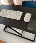 Ultra Slim 24 Inch Laptop Keyboard And Mouse Stand With Sit Stand Adjustable Riser on desk, showing keyboard and mouse setup.