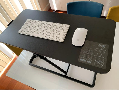 Ultra Slim 24 Inch Laptop Keyboard And Mouse Stand With Sit Stand Adjustable Riser on desk, showing keyboard and mouse setup.