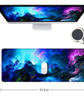 Ultra Wide Galaxy Desk Pad For Gaming And Work Non Slip Rubber Base Mouse Pad 31.5x11.8 Inch With Stitched Edges Keyboard And Mouse Mat Desk Pad Protector 3mm Thick Large Surface Smooth Glide shown on desk with monitor and coffee cup