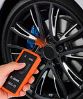 TPMS Relearn Tool for Most Vehicles OEC T5 Activation and Reset Tire Pressure Sensor Programming Orange Kit for Fast Sensor Relearn After Tire Rotation or Replacement, orange ABS handheld tool with 9V battery indicator, used on wheel sensor