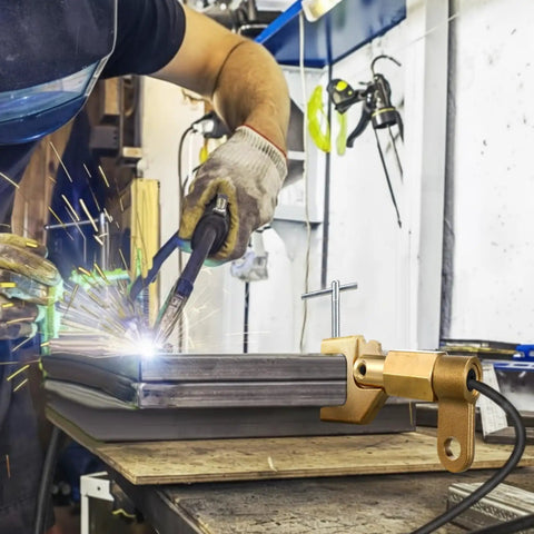 Welder using 600 Amp Welding Ground Clamp, Beefy Solid Brass Grounding Clamp for heavy duty arc welding on metal surface