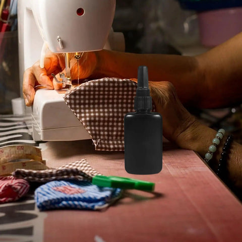 Phenofice Black Glue Dispensing Bottles 50 Ml Hdpe Precision Nozzle Set Dye Storage used in sewing project close-up.