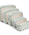 Four green checkered waterproof TPU pouches from Five Piece Diaper Bag Organizer Set And Travel Toiletry Bags Waterproof TPU Makeup Bag Set For Women And Kids TSA Approved Durable Travel Storage Pouches Great Mothers Day Gift Mom Hack On The Go.
