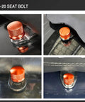 Knurled Aluminum Rear Seat Screw With Rubber Ring For Quarter Inch Twenty Thread Fits Touring Sportster Softail Dyna Street Glide Road King Fat Bob 1996 2025 Orange showing installed on motorcycle seat