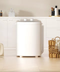 Heavy Duty Portable Washing Machine With 5.5 Pound Capacity And Quick 110V Spin Cycle in modern laundry space.
