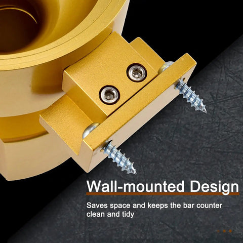 Close-up of the Hustle Ready Wall Mounted Coffee Bean Dispenser showing wall-mounted design with gold finish and screws.