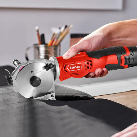 Sencan Cordless Electric Rotary Shear Cutter, 14.4V rechargeable fabric scissors cutting through thick black fabric.