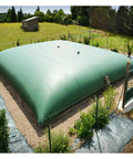 500 Gallon Portable Collapsible Water Storage Tank Built Tough From Durable PVC Canvas in a garden setting.
