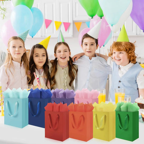 Children at a party with 4 Pack Gift Bags With Handles 8 X 5 X 10 Inch Includes 8 Tissue Paper Color Combo Pink Purple Deep Blue Sky Blue