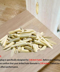 Solid Wood Pocket Hole Plugs Set Pine Wood Plugs for Pocket Hole Jig Tools 100 Pieces shown on wooden board