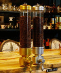 Wall Mounted Coffee Bean Dispenser With Clear Acrylic Jar For Busy Cafes And Brew Spots Detachable Sealed Hopper Keeps Beans Fresh No Fuss Wipe Down Large 5100g Spot Ready Setup with gold and silver containers.