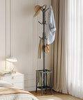 Freestanding Coat Rack With Umbrella Holder And Twelve Hooks, Entryway Hanger Stand in black metal, in living room corner
