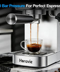 Total Game Changer 20 Bar Espresso Maker With Sleek LCD Display And Bulletproof Milk Frother brewing espresso into a glass cup.