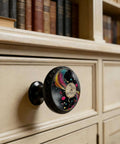 Four Pack Colorful Vinyl Record Music Sign Cabinet Knobs Acrylic Round Drawer Pulls mounted on a wooden cupboard