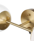 Close-up of Celestia 2-Light Wall Sconce In Matte Brass With Frosted Glass Shades For A Modern Glam Vibe And Soft Cozy Glow