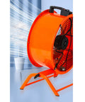 Built Like A Tank 20 Inch Heavy Duty Industrial Floor Fan With Oscillating Head Pumping Raw High Velocity Airflow To Keep Warehouse Factory Workshop Or Commercial Garage Cool, seen from the side with orange housing.