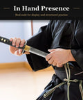 Wakizashi Iaito Unsharpened Stainless Steel Practice Sword For Iaido and Iaito Kata 21 Inch Blade With Bo Hi in hand.