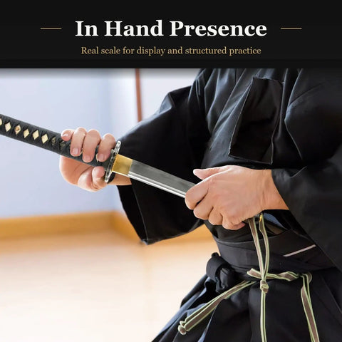 Wakizashi Iaito Unsharpened Stainless Steel Practice Sword For Iaido and Iaito Kata 21 Inch Blade With Bo Hi in hand.