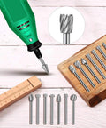 Carving bits set for wood engraving, 20-piece HSS burrs with 1/8 in shank, shown with green rotary tool and wooden rack