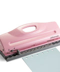 Adjustable 6 Hole Punch For Planners And Binders With 8 Sheet Capacity In Pink A5 Ready Right Out Of The Box, shown with hole-punched paper
