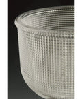 Close-up of clear double prismatic glass shade from Archie Collection 4-Light Bath Vanity Light With Clear Double Prismatic Glass Shades In Venetian Bronze Finish, Coastal Farmhouse Vibes For Bathrooms, Vintage Vibe With Soft Warm Glow And Easy Install.