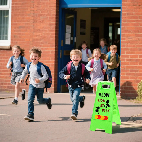 Three Pack Kids Playing Signs For Street Reflective Slow Down Alert Sign With Double Sided Text Graphics installed near school entrance.