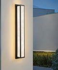 Dope Outdoor Wall Light 20W LED Exterior Fixture, 31.5 Inch IP65 Waterproof Sconce mounted on a wall, warm white glow, black iron backplate.