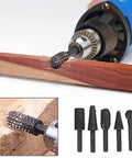 Five Piece Rotary Burr Set For Woodworking Metal Carving And Polishing With One Quarter Inch Shank in use on wood with power drill