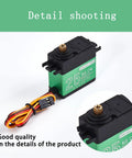Close-up of a 15Kg Digital RC Servo Motor with Metal Gear Waterproof 25T Servo Horn, green color, used for RC vehicles and robotics.