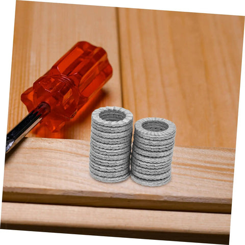 Top Shelf Tapered Lock Washers For M10 Manganese Steel 20 Pack on wooden surface with screwdriver, showing heavy-duty design.