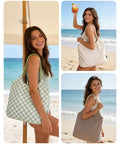 Woman holding Waterproof Beach Tote Bag For Women With Zipper at the beach, showing its medium size and sandproof design.
