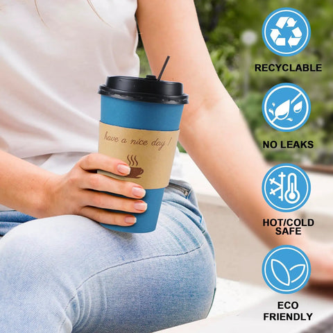 Person holding 100 Pack 16 Oz Disposable To Go Coffee Cups With Lids, Sleeves And Stir Sticks For Grab And Go Hot Or Cold Drinks, Leakproof And Spill Resistant Paper Cups For Office Home Shop Events Navy, with eco-friendly icons.