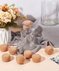 8 Pack Wooden Cork Stoppers For Wide Mouth Bottles 1 To 2 Inch Opening Tapered Corks With Wooden Lids on table next to jars