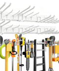 99 Inch Garage Tool Organizer Wall Mount With 18 Heavy Duty Hooks, Pegboard Style Storage Rack For Garage Shed Yard, Holds Up To 750 Lbs, White Color Keeps Tools Handy And Floors Clear displaying tools like shovels, ladder, saw in white.