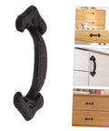 Retro Style Cabinet Door Pull Handles 1 Set Sturdy Furniture Grips For Cabinets Closets And Dressers Vintage Design Easy To Open No Burrs For A Comfy Touch, black metal pull handle shown on various wooden drawers.