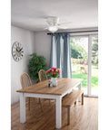 Indoor Low Profile Ceiling Fan With LED Light And Pull Chain Control 42 Inch Fresh White Ultra Quiet installed in a dining room.